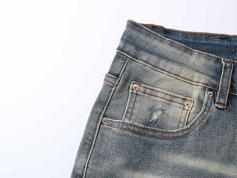 AMIRI Light Blue Letter Patch Denim Shorts — detail